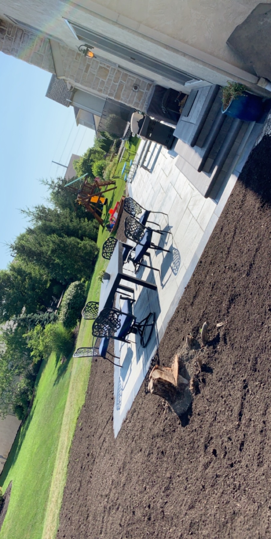 Finished patio with outdoor furniture